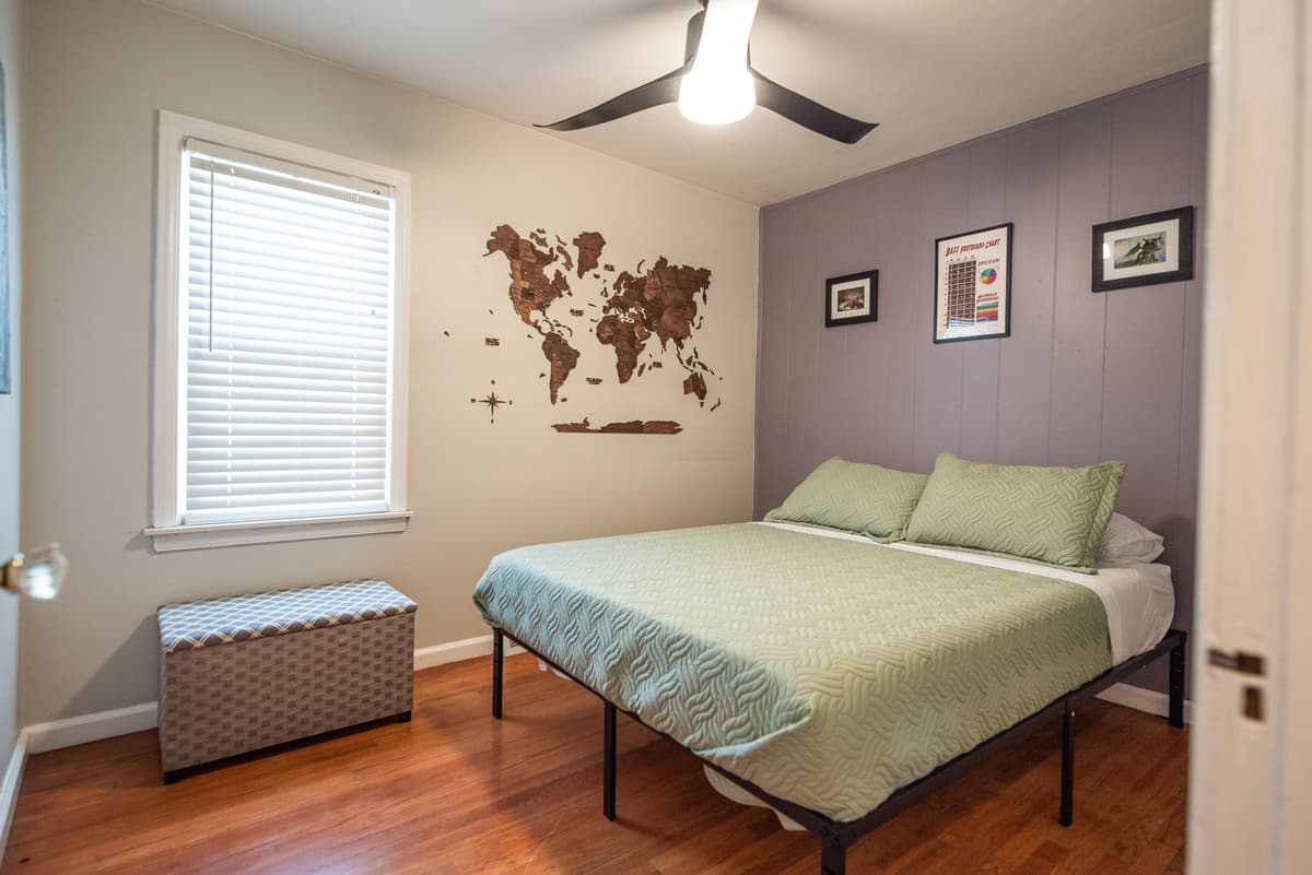 Casa Alpaca bedroom with world map decor